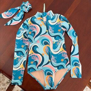 Mott50 swimsuit with matching hair bow